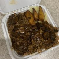 Oxtails · Meal includes choice of  Rice & Peas or White Rice, Cabbage and Plantains.