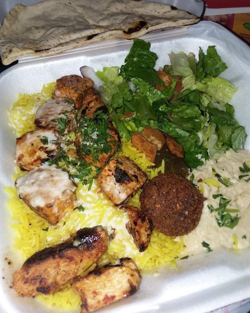 Sahara Entree Plate · Each plate comes with basmati rice, falafel, hummus, fattoush salad, dolmas and fresh pita.