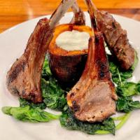 Cajun Lamb Chops · Rosemary infused lamb chops grilled then served with a crispy potato filled with ranch dress...