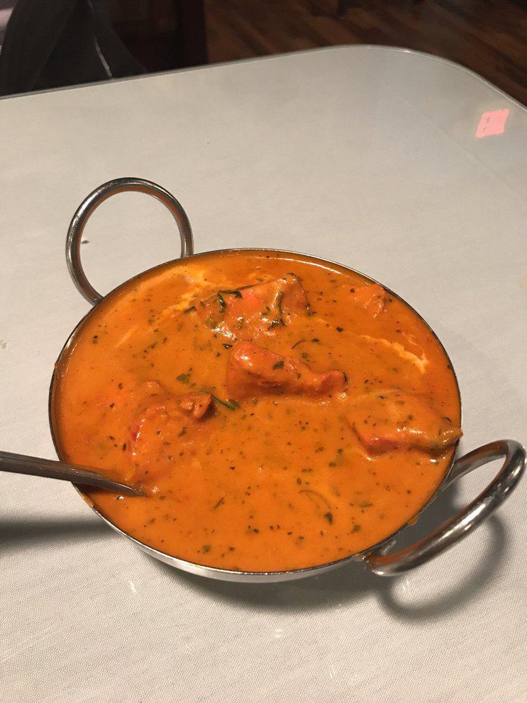 Chicken Tikka Masala · Cube of white meat chicken tandoor style, cooked in rich tomato sauce.