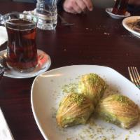 Baklava · Sweet pastry of layers of phyllo dough filled with crushed walnuts and topped with honey syr...