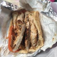 Marinated Chicken Breast Sandwich · Chicken breast in our own special marinade, charbroiled to perfection. Served on pita bread ...