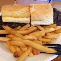 Skirt Steak Sandwich · Served with french fries.