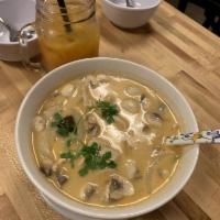 Tom Kha Gai Soup · Coconut milk soup with chicken, mushrooms, green onions, onions, galangal, lemongrass and ka...