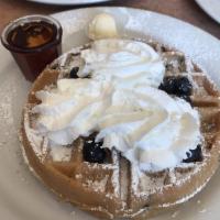 Blueberry Waffle · Belgian waffle with blueberries cooked inside and on top. Low-fat honey yogurt or whipped cr...
