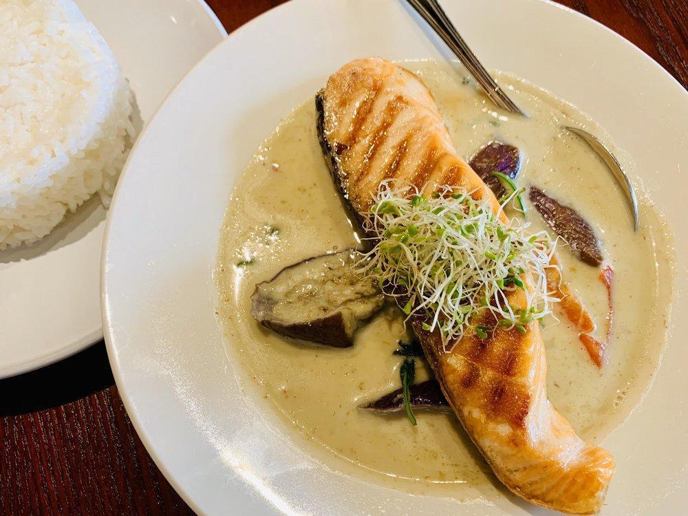 Salmon Green Curry · Grilled salmon served in green curry with bell pepper, eggplant, and basil. Served with jasmine rice.