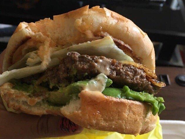 Avocado Burger · Grilled 1/4 lb. beef patty served on a toasted bun with lettuce, tomato, onion, pickles, Thousand Island and mayo. 