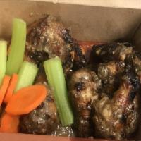 Jerk Wings · 10 Wings, smoked then grilled to order. Served with choice of smoked bleu cheese or herbed r...