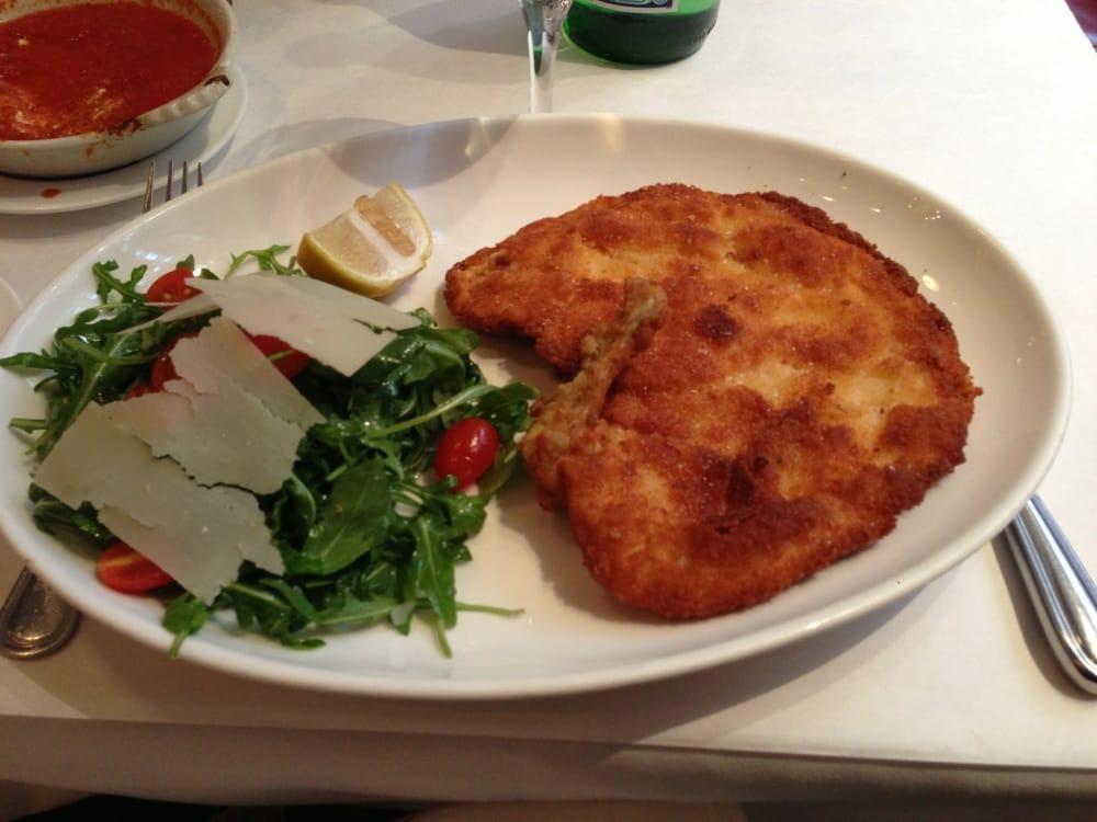 Chicken Milanese · arugula salad, tomato, parmigiano cheese
