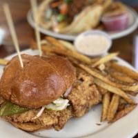 Buttermilk Fried Chicken Sandwich · Southern fried, IPA pickles, and house slaw.
