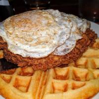 Chicken and Waffles · Boneless fried chicken, buttermilk waffle, fried eggs.