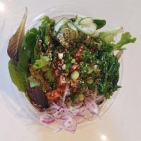 Volcano Lava Bowl · Rice and greens, tuna, salmon, albacore, Korean lava sauce, cucumber salad, red onion green ...