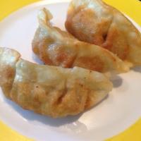 Gyoza · Dumpling with a minced filling. (4 piece)