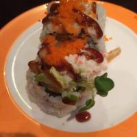 Spider Roll · Crab meat, cucumber, avocado, soft shell crab with tobiko, kaiware, lettuce and unagi sauce.