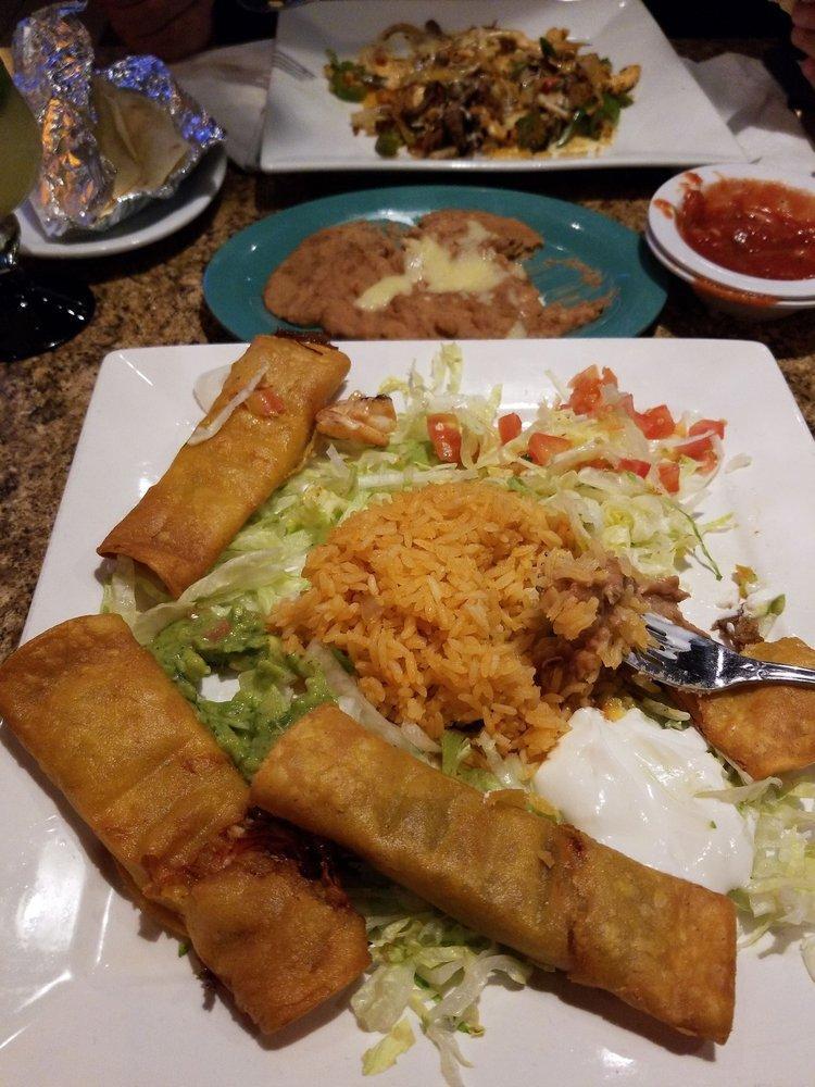 Flautas · 4 fried corn taquitos 2 shredded beef and 2 shredded chicken. Served with rice, lettuce, guacamole, tomatoes and sour cream.