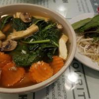 Vegetarian Pho · Gluten free without soy sauce. Vegetarian version of pho with veggie broth, topped with Viet...