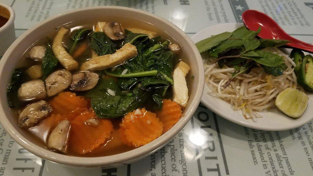 Vegetarian Pho · Gluten free without soy sauce. Vegetarian version of pho with veggie broth, topped with Vietnamese broccoli leaves, carrot, mushroom, onion, scallion, and fried shallot. Gluten free.