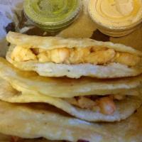Quesadilla · Flour tortilla, cheese and choice of meat