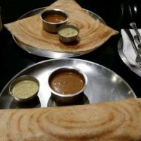 Mysore Masala Dosa · Rice crepe sprinkled with special spices, filled with potato and onion masala served with co...