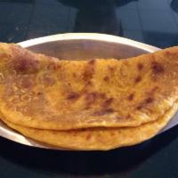 Puran Poli 2 Pcs · 2 soft sweet bread filled with a mixture of jggery, saffron, cardmom and lentils.