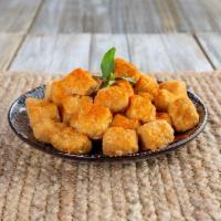 Fried Tofu · Crispy, bite-size tofu dipped in potato batter to create a crispy outside and soft inside. D...
