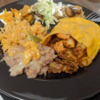 Burrito Jarocho · Flour tortilla filled with tender pieces of marinated chicken, beef, and sautéed shrimp and ...