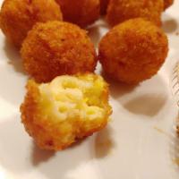 Mac and Cheese Fritters · Crispy shelled mac and cheese.