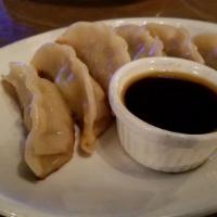 6 Pot Stickers · Rice dumplings filled with your choice of chicken, vegetables or pork steamed and then pan s...