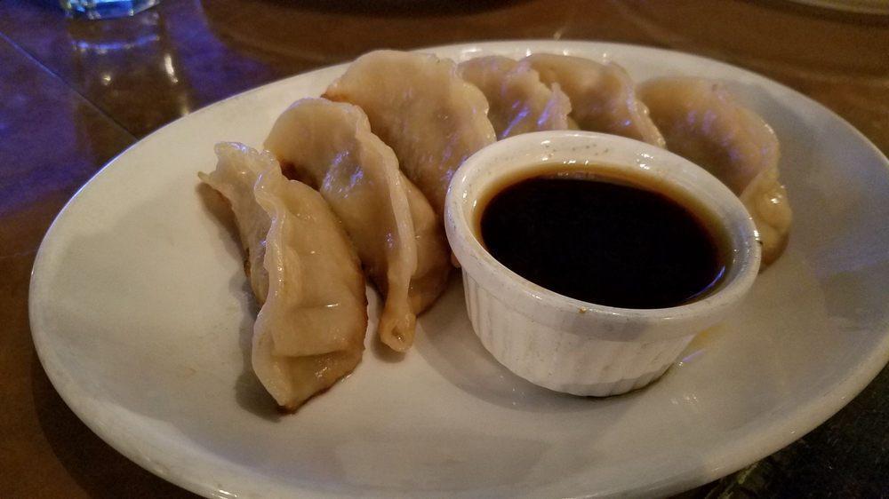 6 Pot Stickers · Rice dumplings filled with your choice of chicken, vegetables or pork steamed and then pan seared.