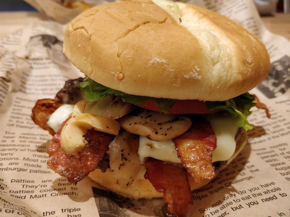 Double Bacon Burger · 2 fresh, 100% all beef patties, 4 slices of bacon, American cheese, topped with ketchup, mustard, raw onions, pickles, lettuce and tomato.