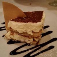 Tiramisu · 2 layers of espresso drenched sponge cake divided by mascarpone cream and dusted with cocoa ...