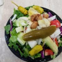 Greek Salad · Mixed greens, tomatoes, feta cheese, cucumber, kalamata olives, red onions, peppercinnis and...