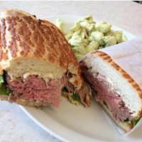 Eye of the Round Roast Beef Sandwich · With daily cooked in house roast beef.