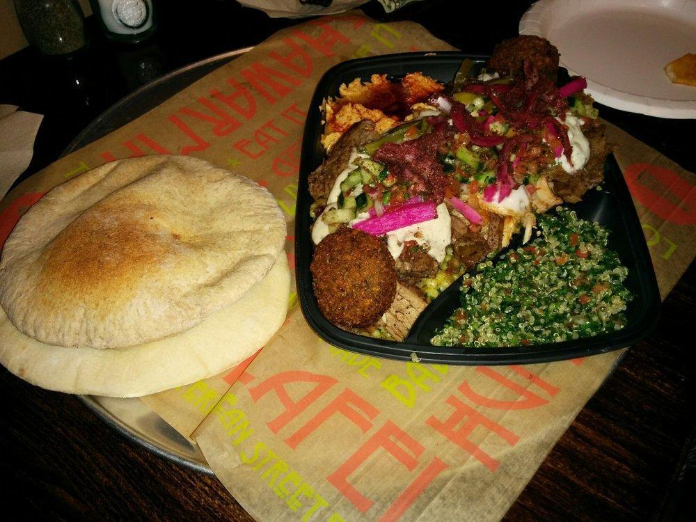 B G Platter · Basmati rice topped with steak and chicken shawarma and gyro, falafal , quinoa tabouleh, hummus or baba ganoush and fresh baked pita.