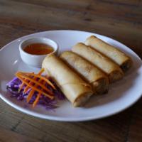 4 Piece Spring Rolls · Homemade deep fried spring rolls stuffed with vegetables, silver noodles, and chicken served...