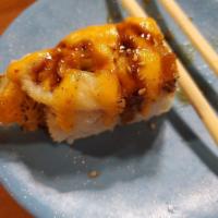 Chiyo Roll · Shrimp tempura inside, sushi ebi on top and seared.