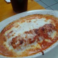 Cannelloni · Pasta shells filled with ground beef, spinach, and mozzarella cheese.