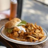 Buffalo Chicken Sandwich · Fried Chicken Tenders tossed in Buffalo Sauce topped with Ranch on a Toasted Roll.