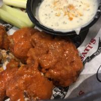 Boneless Wings · Tossed in choice of sauce and served with choice of dressing.