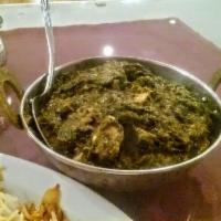 Saag · Spinach cooked with special spices and herbs. Served with complementary basmati rice.