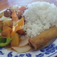 Sweet and Sour Chicken · Breaded chicken breast and fried with white onion chunked pineapple, green peppers and carro...