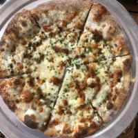 Sedgewick Pizza · Whipped ricotta, mozz, tallegio, Parm, truffle honey, and chives.