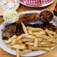 1/2 Rack of Ribs with Quarter Chicken or Pork · 