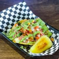 Vampiro · Broiled corn tortilla and melted cheese. Topped with pico de gallo and house
guacasalsa.