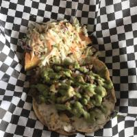 Taco Gobernador · Grilled corn tortilla, stuffed with shrimp and mozzarella cheese. Topped with shredded
cabba...