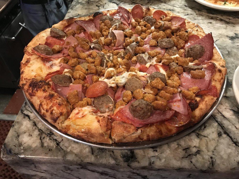 Meat Lovers Pizza · Pepperoni, sausage, Canadian bacon, salami and meatballs.