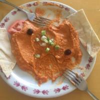 Spicy Hummus · Roasted red pepper hummus with a spicy flare.