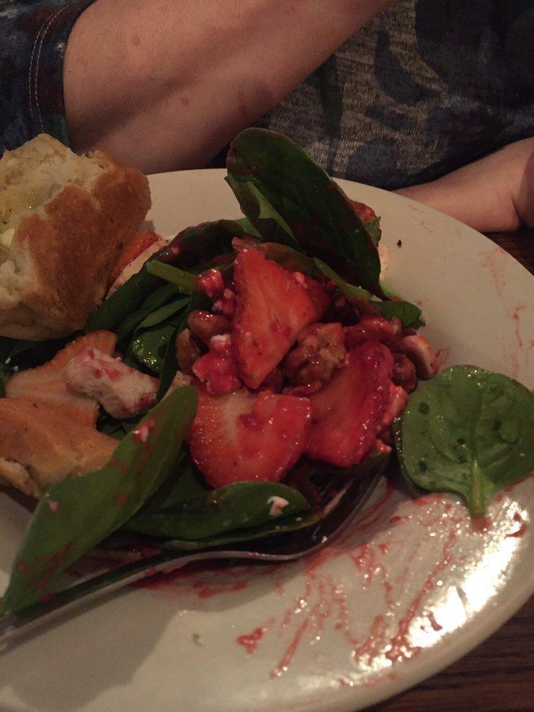 Berry Spinach Salad · Baby spinach, sliced strawberries, candied walnuts, roasted chicken breast, and goat cheese. Served with our raspberry vinaigrette. 
