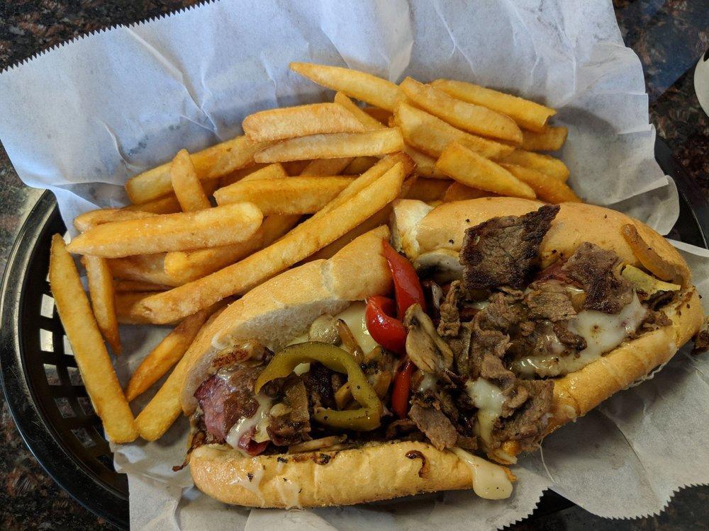 Cheesesteak & Grill Stop · Chicken Wings · Cheesesteaks · Burgers