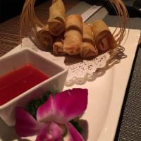 Crispy Vegetable Spring Roll · 6 pieces with Thai chili sauce. Spicy.